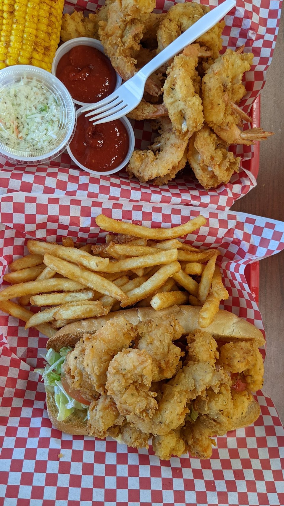 Seafood menu showing shrimp, oysters, and crab claws.